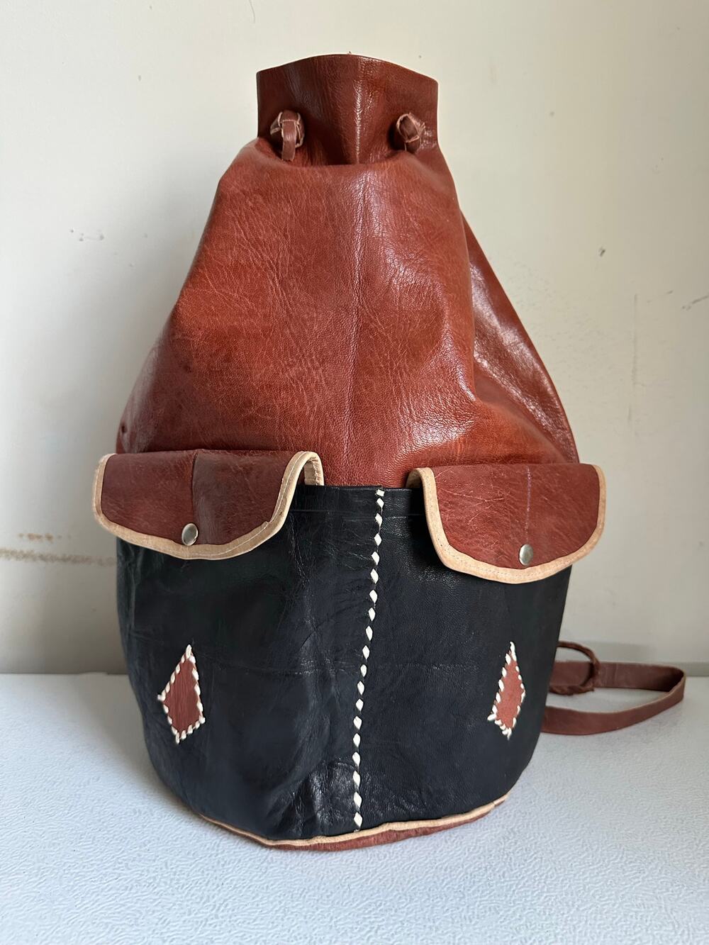 Vintage Moroccan brown and black leather bucket bag handcrafted art